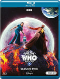 Blu-ray cover of 'Doctor Who' Season Two with two characters on a planet and Earth in the background.